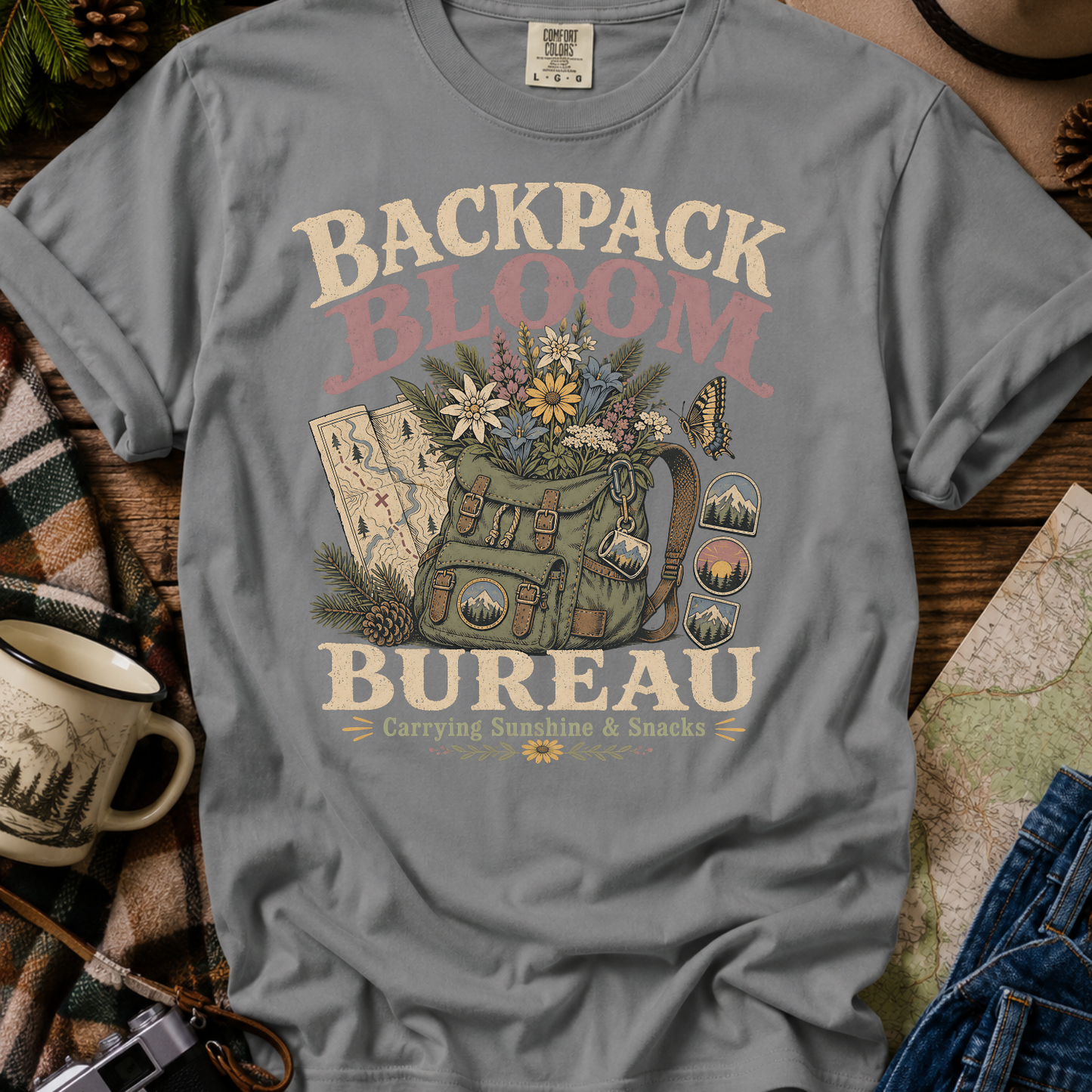 Backpack Bloom Bureau T-Shirt — Botanical Adventure Graphic Tee